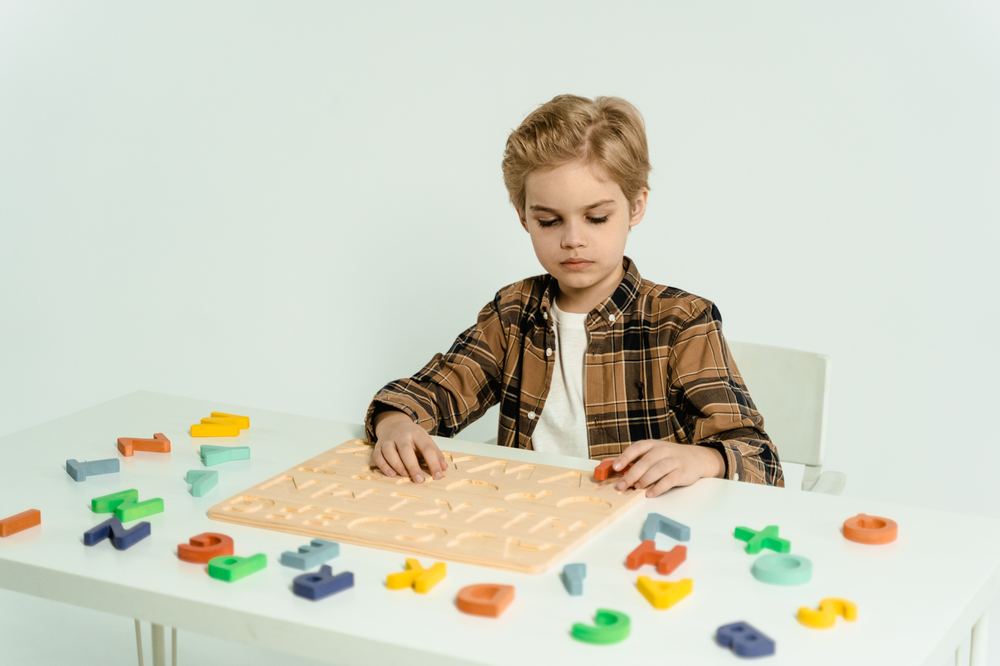 A child working independently with a task board